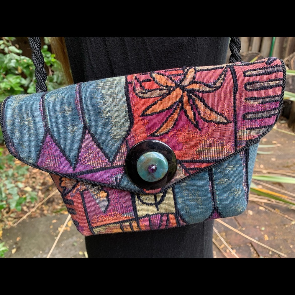 Shoulder strap clutch bag